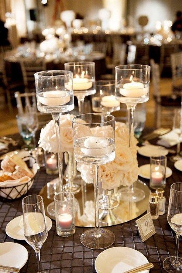 centerpieces wedding elegant candle candles winter centerpiece table floating inspiring reception decorations trends emmalovesweddings flowers tables weddingomania vases weddings tall