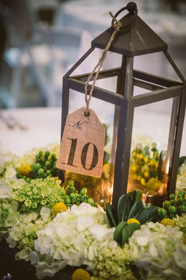 chic rustic lantern wedding centerpiece with burlap table number