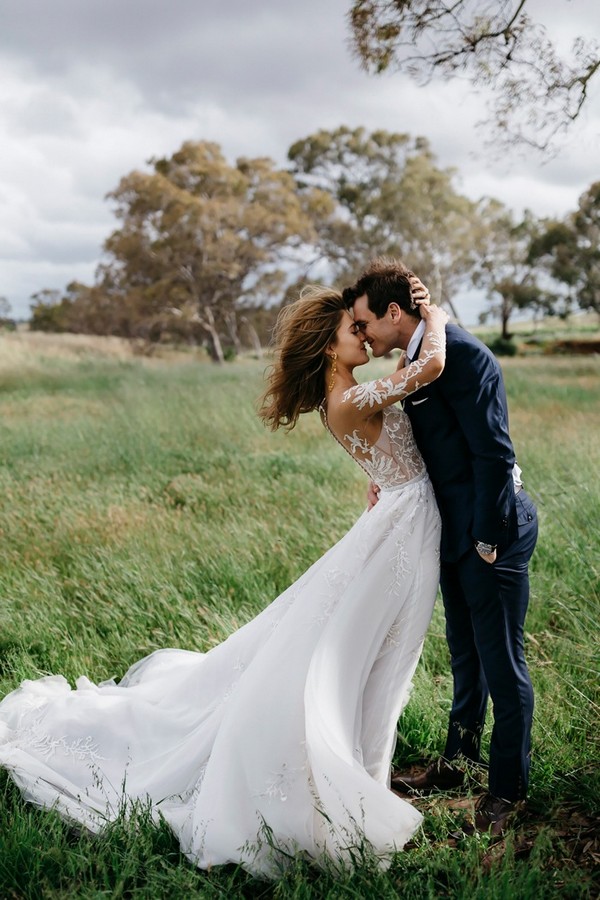 bride and groom windswept wedding photos