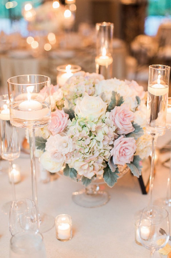 elegant wedding centerpiece with floating candles