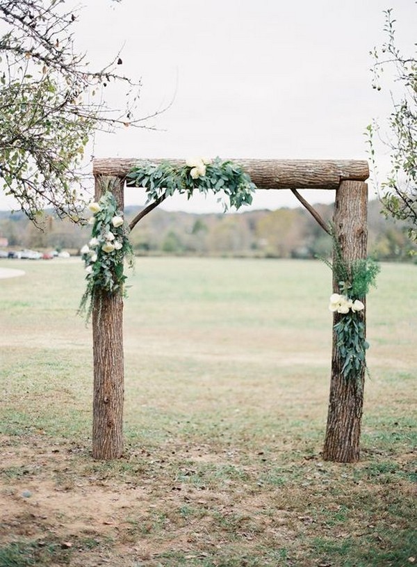 chic simple wedding arch ideas with tree stumps