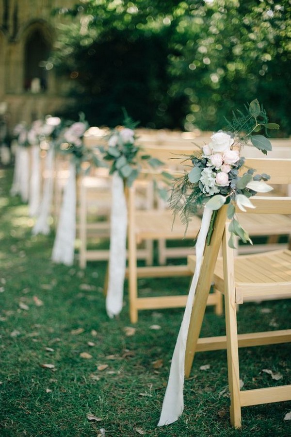 backyard wedding aisle decoration ideas with greenery and ribbons