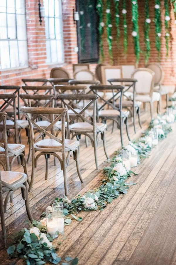 greenery and candles wedding aisle decorations