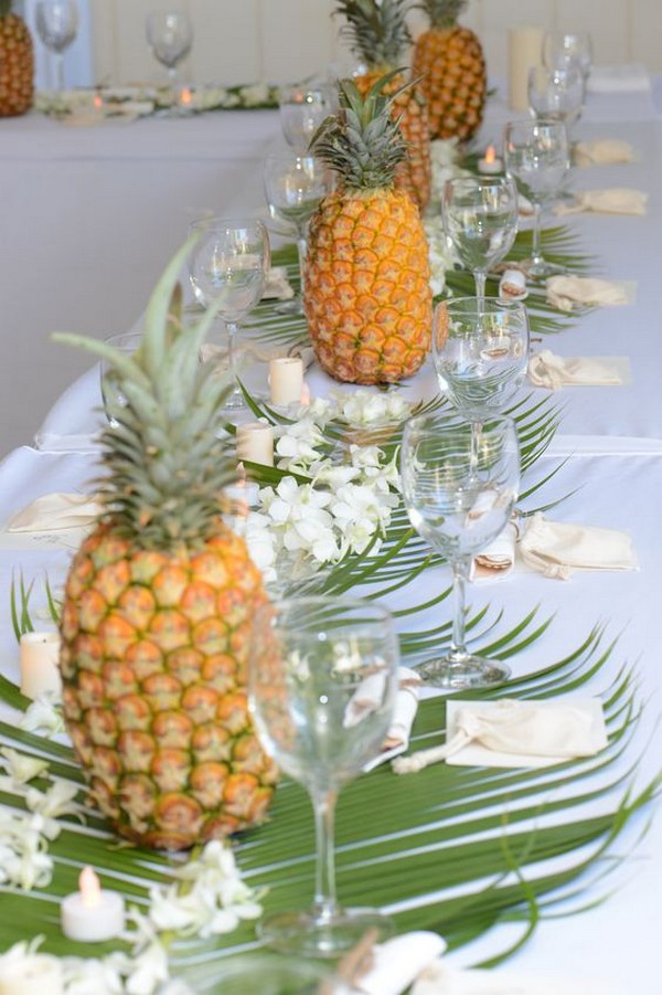 Hawaiian greenery and pineapples tropical wedding centerpeice ideas