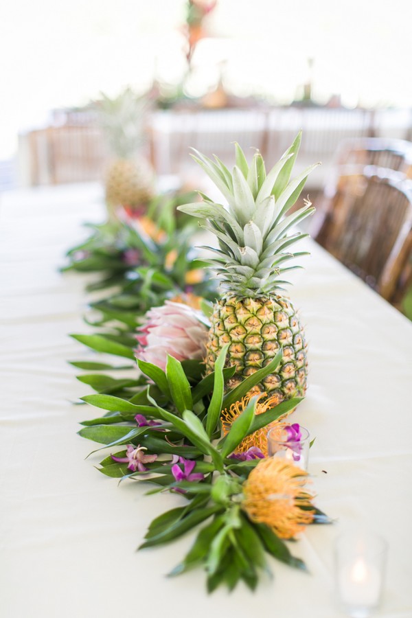 Protea & pineapple tropical wedding centerpiece