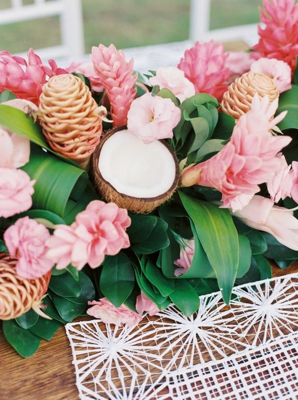 bright shades of pink and green tropical wedding centerpiece