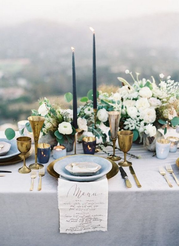 chic wedding centerpiece ideas with tall candles and candlesticks
