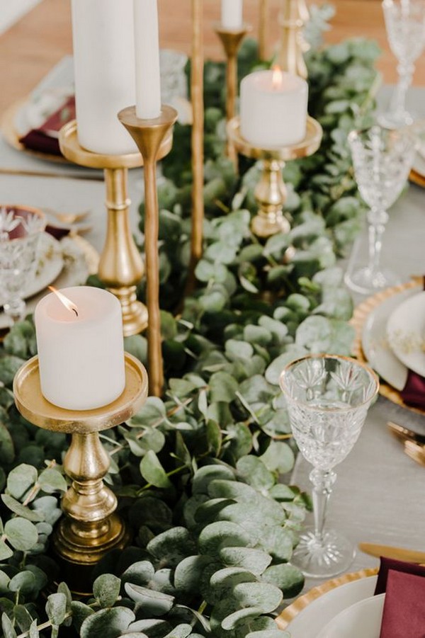 gold and marsala wedding centerpiece ideas with candlesticks and greenery