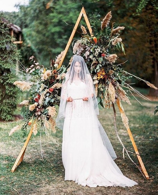 boho fall wedding arch with pampas grass leaves and herbs