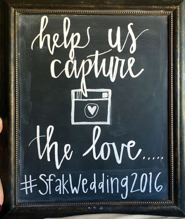 chalkboard wedding hashtag sign