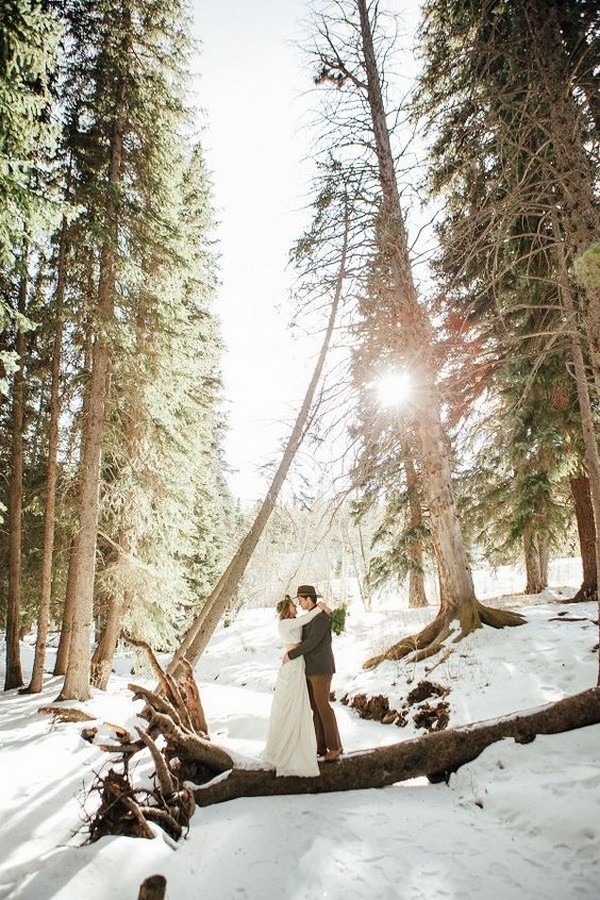 boho winter wedding photo in the forest