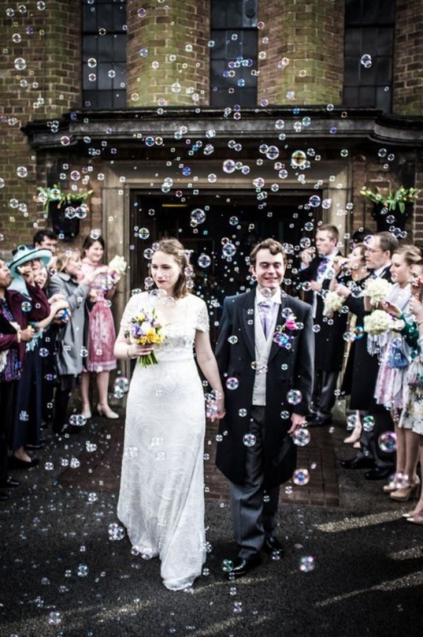 sweet wedding photo with bubbles send off