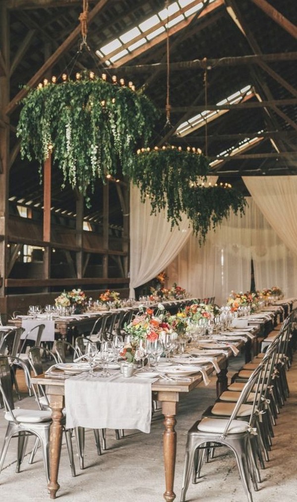 barn wedding reception ideas with greenery chandeliers