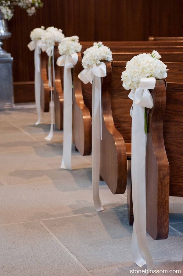 elegant church pew wedding aisle decorations with flowers and ribbons