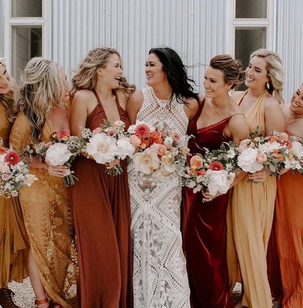 mix and match bridesmaid dresses in shades of orange