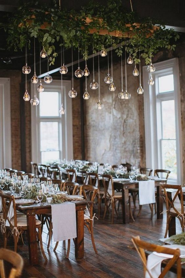 chic loft wedding reception with hanging candles