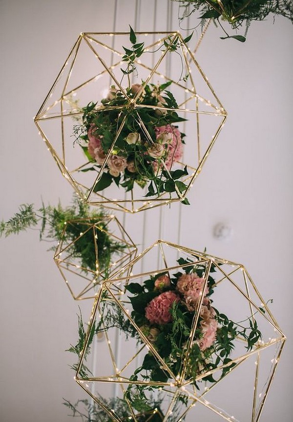 copper geometric wedding decoration with lights and floral