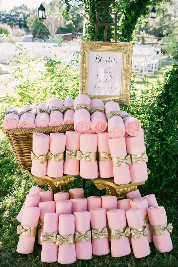 pink blankets as outdoor wedding favors
