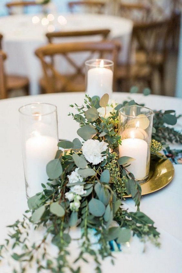 greenery seeded eucalyptus and candle wedding centerpiece ideas