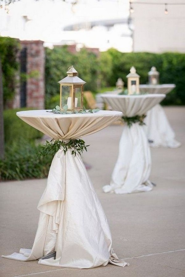 wedding cocktail table with lanterns