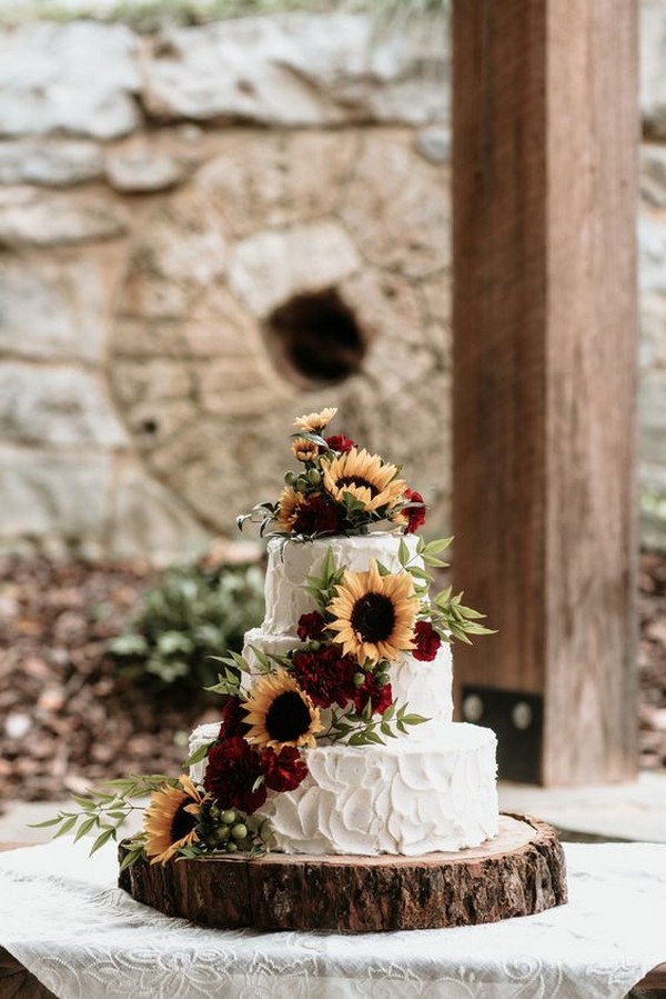 chic rustic wedding cake with sunflowers