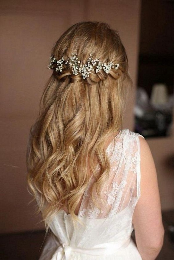 half up half down wedding hairstyle with baby's breath