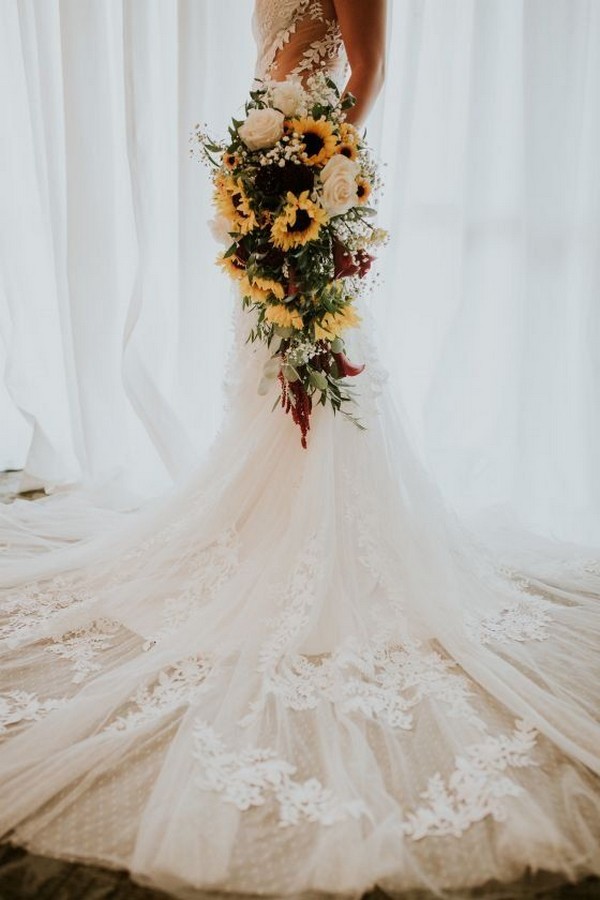 Sunflower cascading wedding bouquet ideas are unmatched.