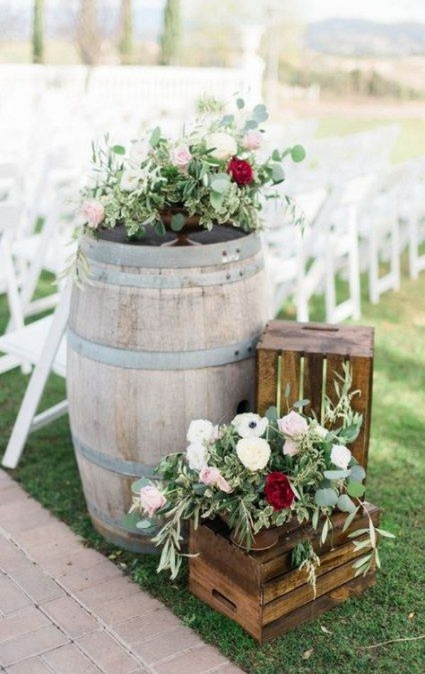 wedding ceremony decorations with wine barrels
