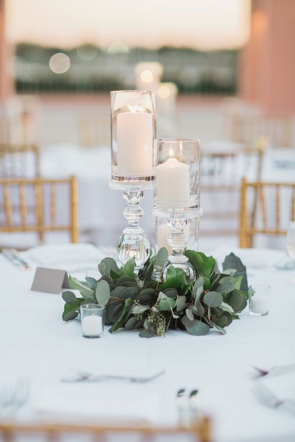 simple greenery wedding centerpiece with candles