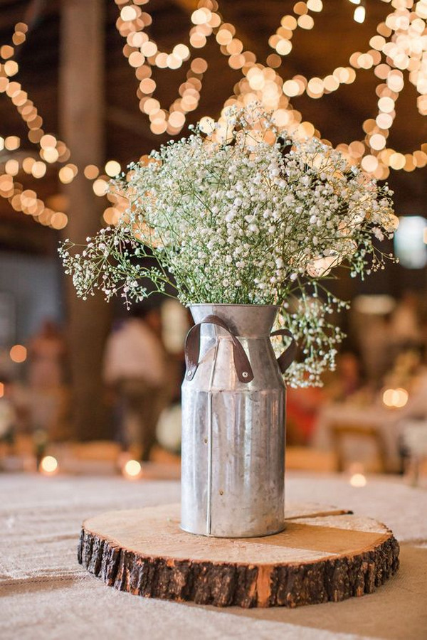 diy country rustic wedding centerpiece with tree stumps