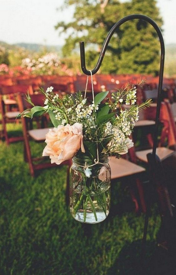 rustic wedding aisle decor ideas with mason jars and floral