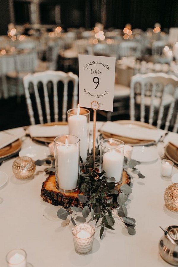 budget friendly rustic wedding centerpiece with candles and tree stump