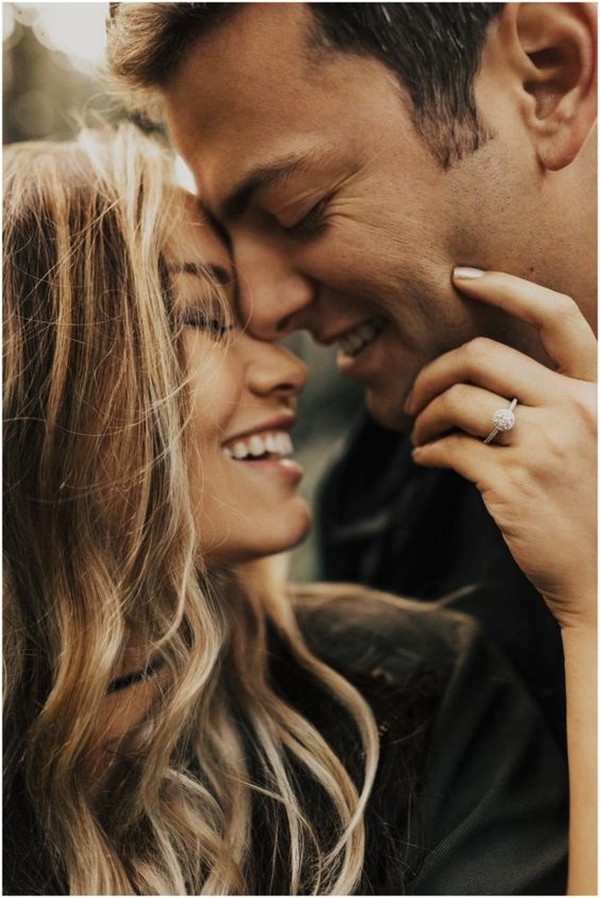 Romantic engagement photos with closed eyes