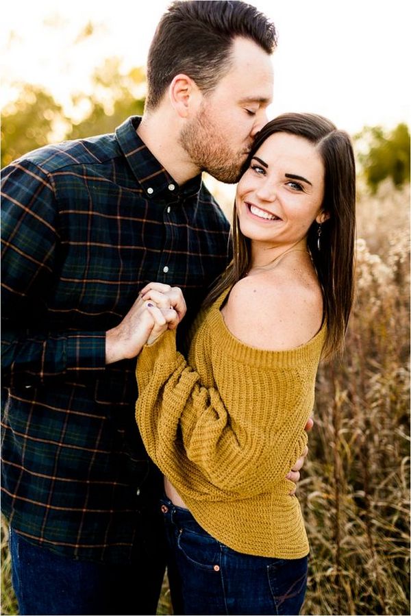 Cute engaged couple in stunning fall outfit
