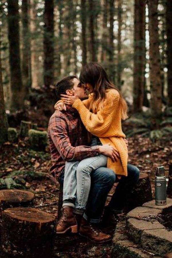 sweet forest love story fall engagement pose