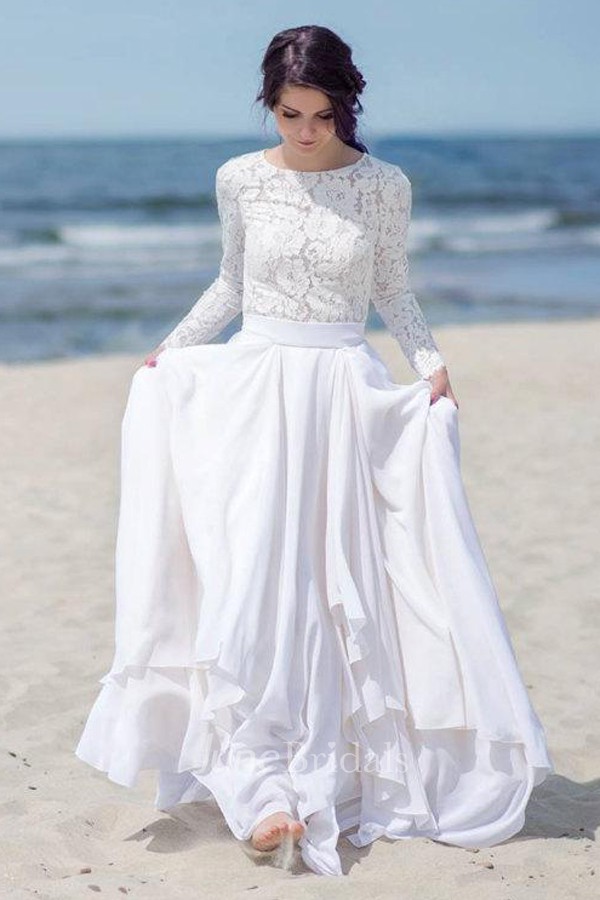 This stylish Mexican wedding dress is made of chiffon, satin, and lace and has a classic button and zipper closure for a timeless appeal.