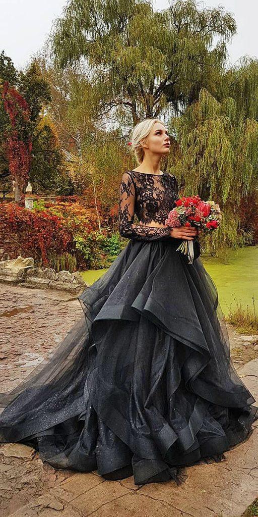 A gothic bride will look stunning in this long-sleeved black fairytale wedding dress.