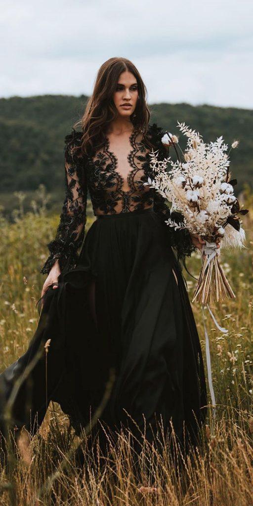 This lace black boho-inspired wedding dress effortlessly combines bohemian whimsy with dark, sultry beauty.