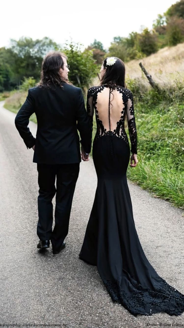 A stunning option for the gothic bride is a black lace mermaid dress with a scoop neck.