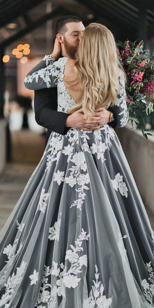If you want to make a statement at your wedding, try on this black and white wedding dress.
