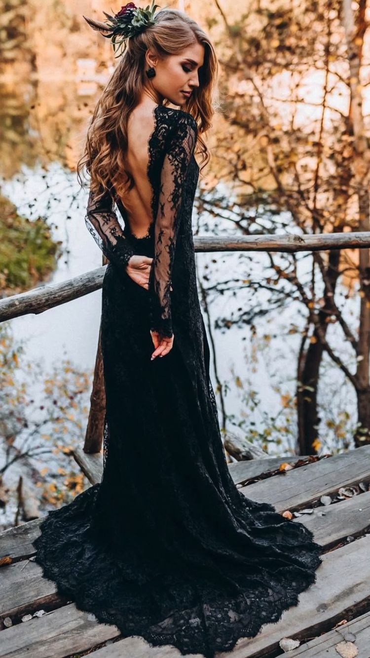 A magnificent black wedding dress with lovely long sleeves is great for a mysterious and fascinating gothic-inspired wedding.