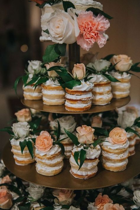 Flower adorned naked mini wedding cake dessert bar