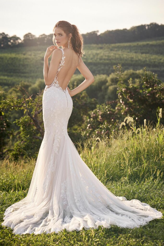 This jersey fit-and-flare gown with a low back will make you feel stunning on your wedding day.