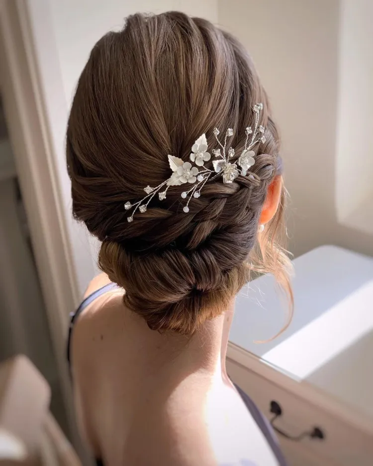 French braided updo wedding hairstyles for medium hair are a popular choice for brides who want a classic and romantic look on their special day.