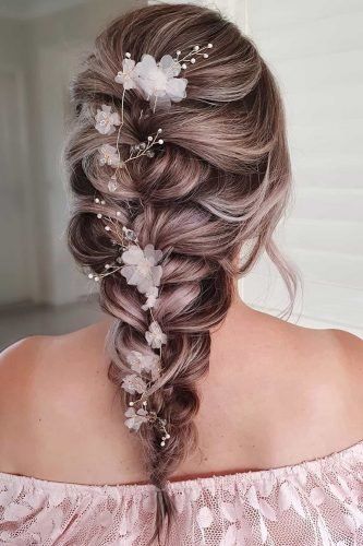 The best part about a loose braid wedding hairstyle for medium hair is that it’s comfortable and will stay in place all day.
