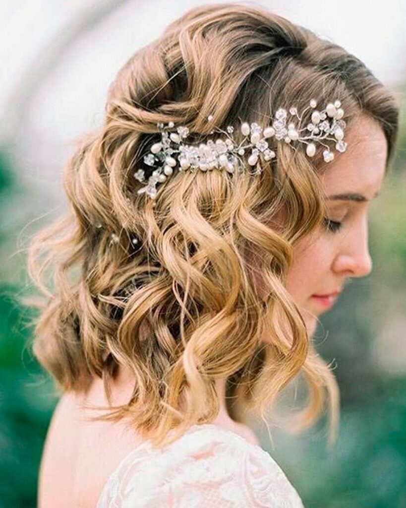 Get ready to steal the show with voluminous curls wedding hairstyles, perfect for medium hair length.