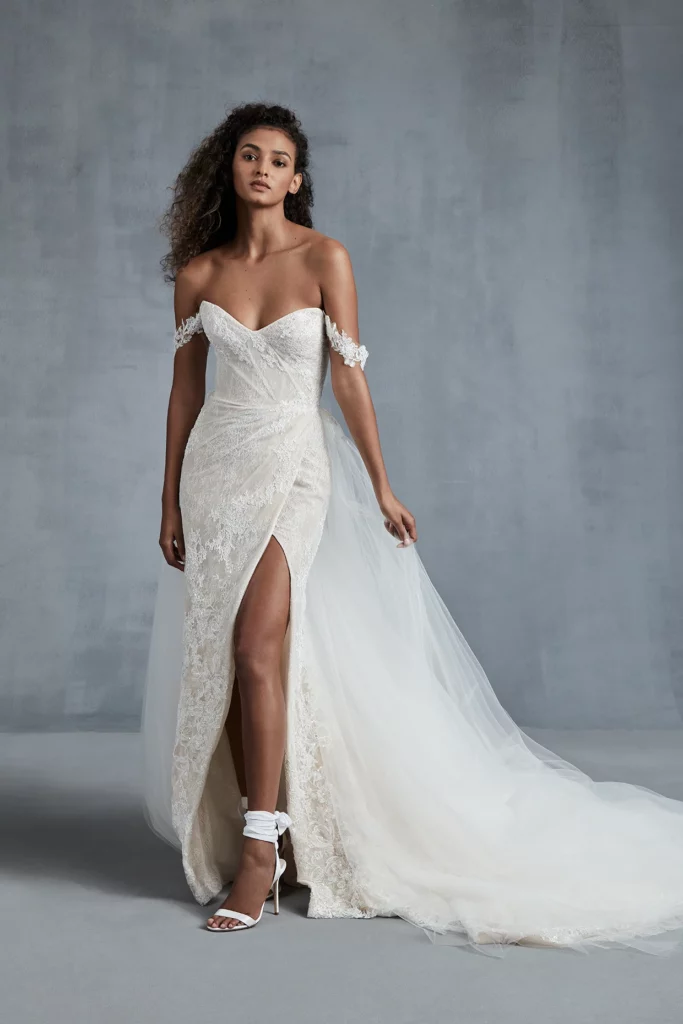 This off-the-shoulder wedding dress is the epitome of elegance