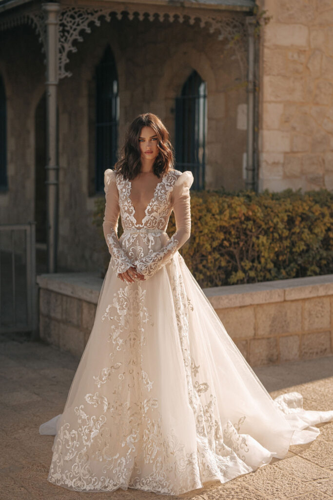 This sheer lace beautiful wedding dress proves you don't need a skin-tight mermaid skirt to be sexy.