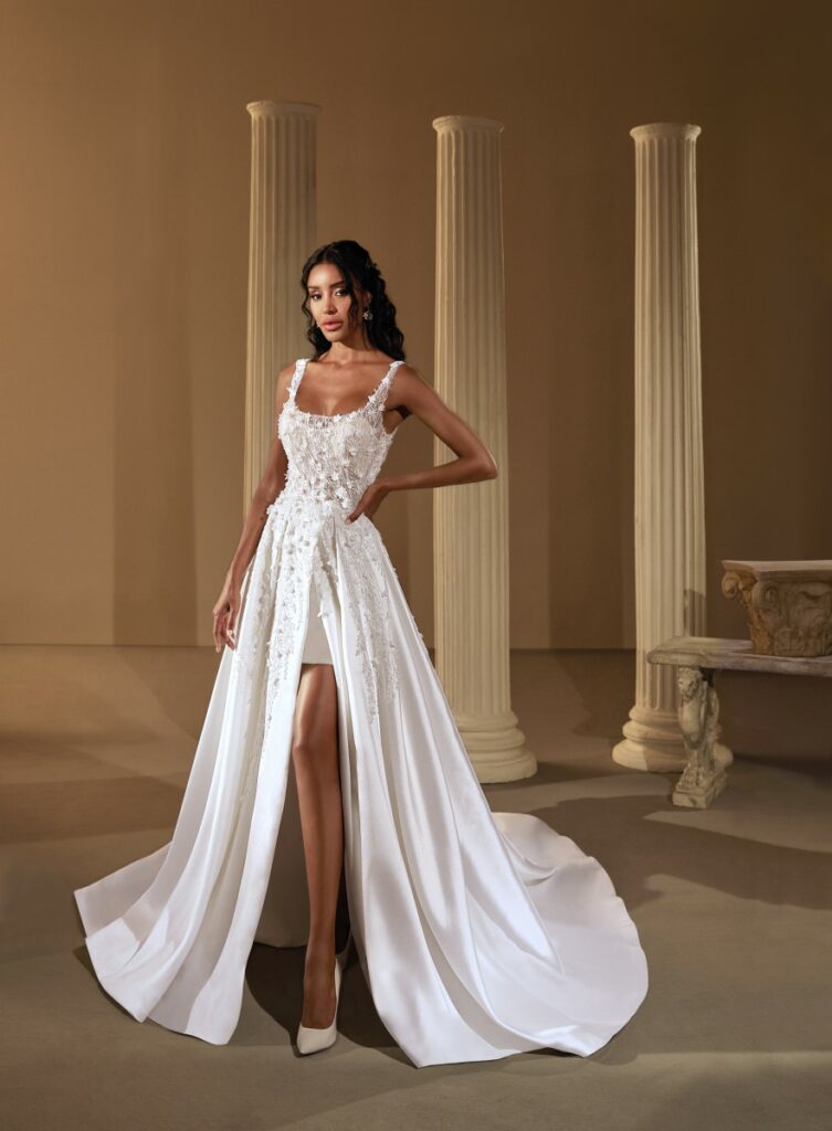 Embrace your inner beauty in a stunning A-line wedding dress made from delicate sheer lace.