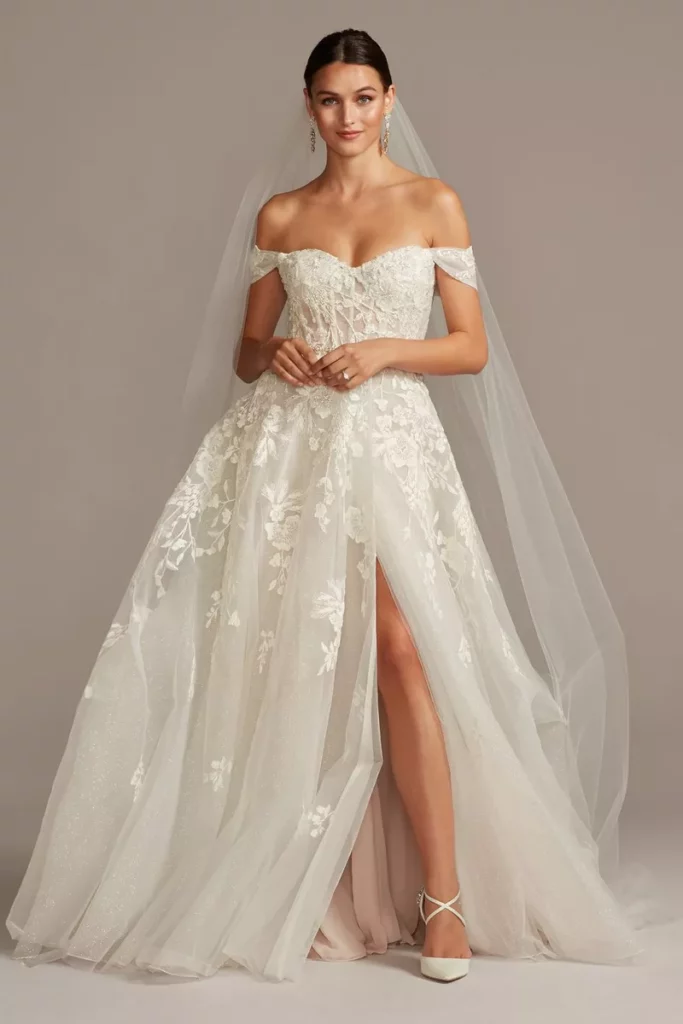 Tulle A-Line wedding dresses with removable sleeves are a dreamy idea for a stunning bridal outfit.